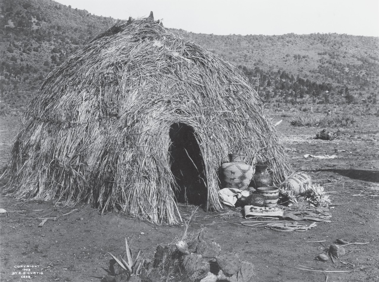 This is an Apache wickiup, which is extremely similar to the sort of house that indigenous people of the Coastal Bend built. Library of Congress, Prints & Photographs Division, Edward S. Curtis Collection